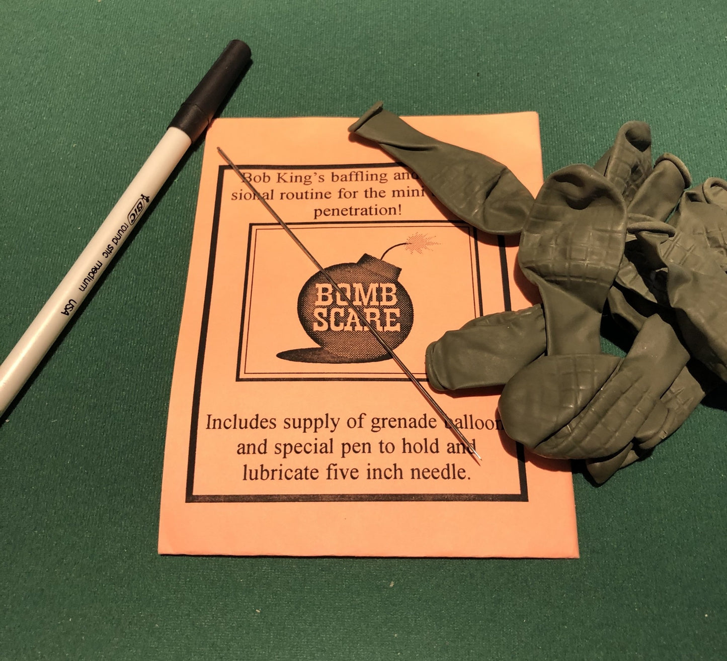 Bomb Scare mini needle through balloon by Bob King M10